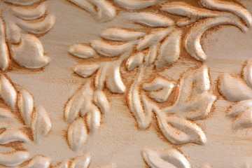 embossed or stamped pattern on tin or metal with an antiqued finish