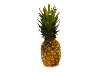 Single whole pineapple isolated on white background