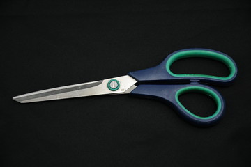 scissors on a black background