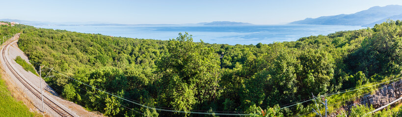 Obraz premium Summer sea panorama with railroad