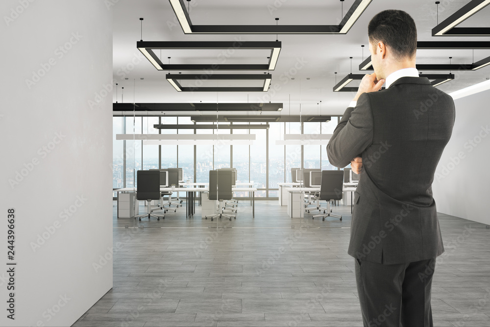 Sticker thoughtful businessman in office