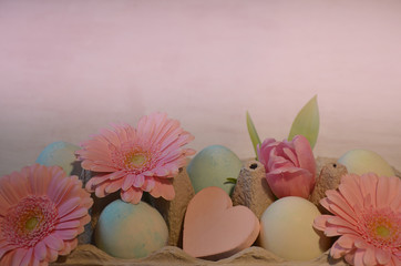 Easter greeting card, colorful easter eggs and flowers
