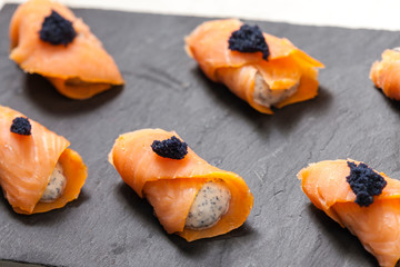 smoked salmon rolls with caviar filling
