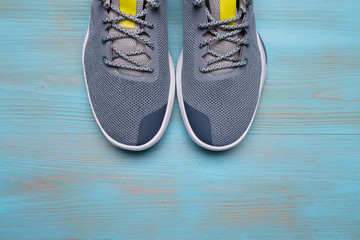One Pair of blue sport shoes on blue background
