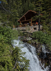 Fototapeta na wymiar Lake Agnes Tea House and Waterfall