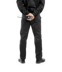 Male security guard with portable radio transmitter on white background