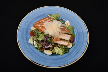 salad with tomatoes, smoked ham,cheese and mayonnaise