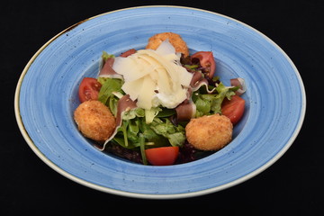salad with tomatoes, smoked ham,cheese and mayonnaise