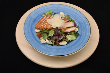 salad with tomatoes, smoked ham,cheese and mayonnaise