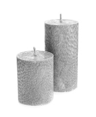 Wax candles on white background