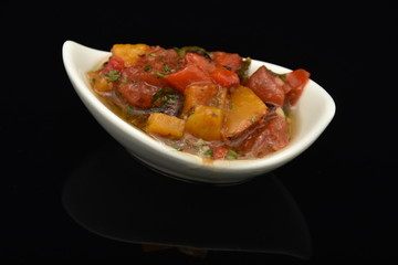 spicy sauce in a white bowl