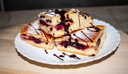 Homemade Apple Pies on rustic background, top view. Classic autumn Thanksgiving dessert - organic apple pie.