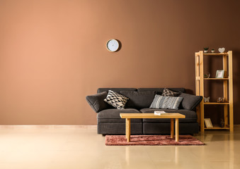 Interior of room with comfortable sofa