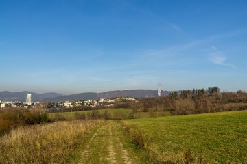 Fototapeta premium Sunrise and sunset over the hills and town. Slovakia