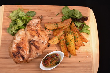 chicken breast with potatoes and salad