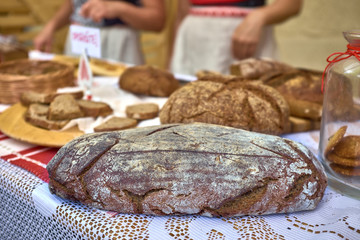 Freshly baked homemade artisan brown bread. Close up.