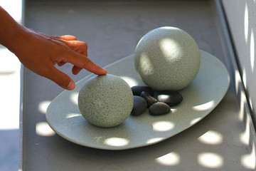 Perfect round balls made of rock and volcanic stones in Santorini