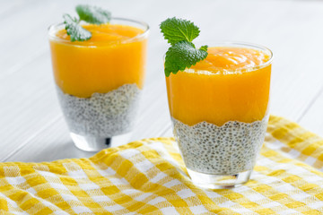Chia seeds pudding with mango puree. Healthy breakfast. Sweet healthy dessert.