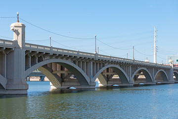 Fototapeta premium Bridge with arches across Tempe Lake in Arizona