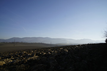Empty agricultural field during winter morning. Slovakia