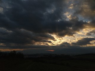 Sunset and sunrise with dramatic colorful clouds. Slovakia	