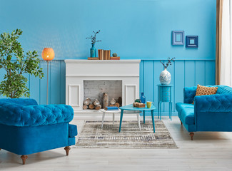 Home decoration, modern white fireplace and home decor, carpet style.