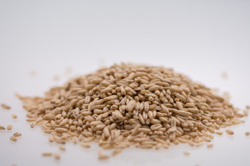 Oat Grains. Pile of grains, isolated white background