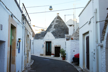 Famous whitewashed stone huts with conical roofs called trulli at Alberobello, Apulia, Italy