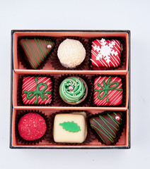 handmade chocolates in box on white background