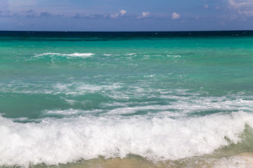 Fototapeta na wymiar Background of waves in turquoise sea