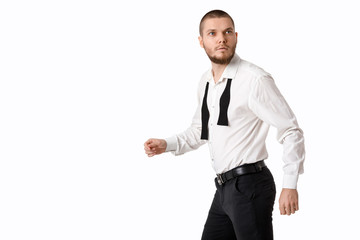 young bearded man in a white shirt and bow tie