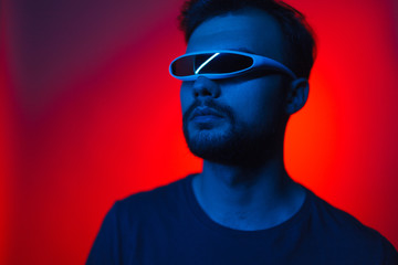 Handsome man in futuristic glasses