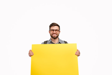 Male student with yellow poster