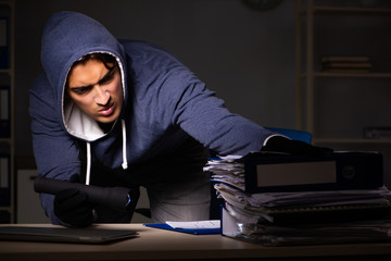 Thief trying to steal personal data in identity theft concept
