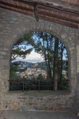 The view through an arch of San Francesco Monastery in Fiesole, Tuscany, Italy.