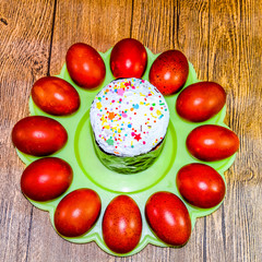 Easter cake and painted red Easter eggs. Food for the Easter tab