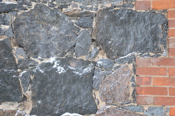 Rough masonry wall.