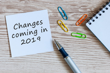 A note Changes coming in 2019. With office or school supplies