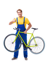 Obraz premium Man repairing his bike isolated on white background