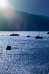 Beautiful landscape of the calm sea with a boat. Travel, rest and holiday concept.