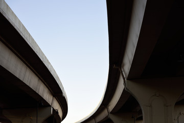 Transportation system infrastructure, twin curved highway bridge on ramps in Colorado, USA