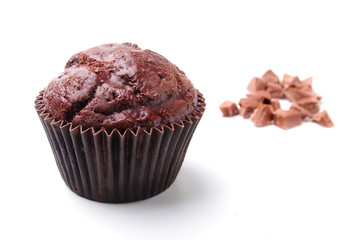 Delicious homemade cupcake with raisins and chocolate isolated on white background. Muffins. Top view.