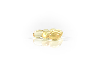 Yellow pills isolated on white background