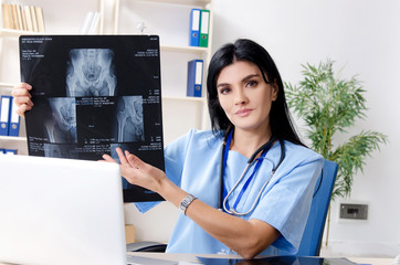 Female doctor radiologist working in the clinic 