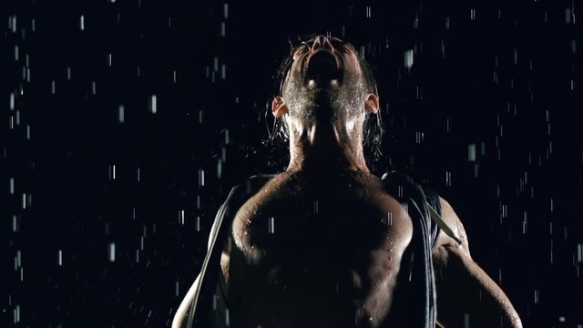 Athletic man getting pumped up for his workout.