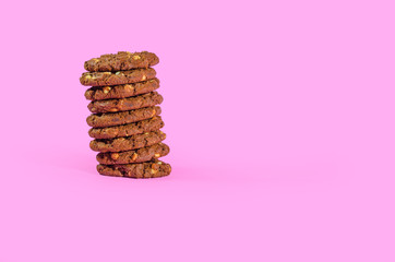 cookies and cakes on pink background white chocolate and cocoa