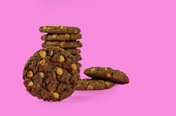 cookies and cakes on pink background white chocolate and cocoa