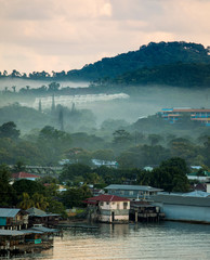 View of Coxen Hole and port on Roatan in morning mist.