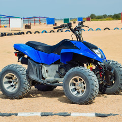 Fototapeta na wymiar Small ATV rentals. Rental services on the beach by the sea