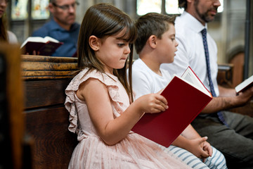 Kids joining their father in prayer
